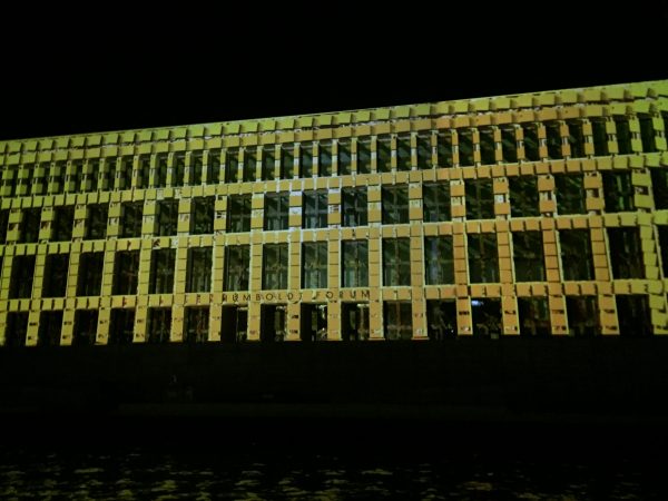 Berlin 1 Berlin's Humboldt Building bathed in projected yellow lights giving a tiled effect to the front wall