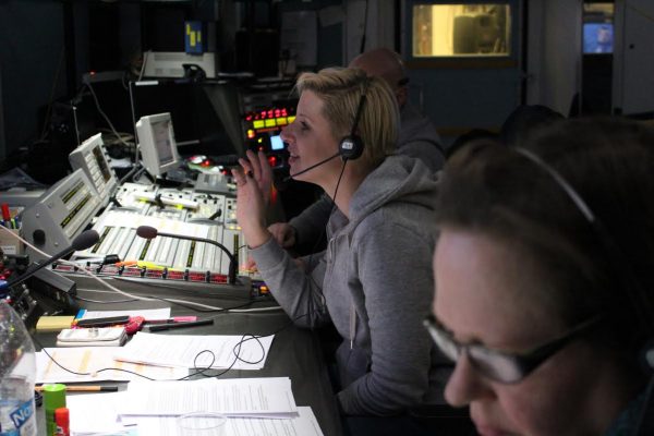 Inari Köngäs and colleagues working at the gallery during talk show production